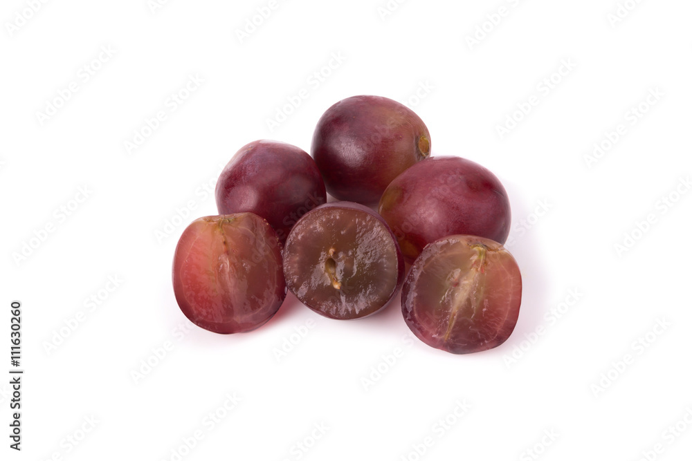 Ripe red grape with leaves isolated on white Ripe red grape with leaves isolated on white