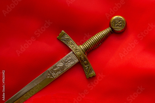 souvenir dagger on a red background