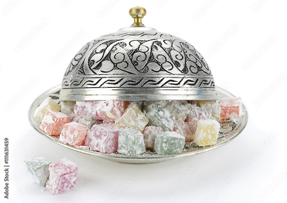 Fototapeta premium Traditional Turkish delight in vintage plate isolated