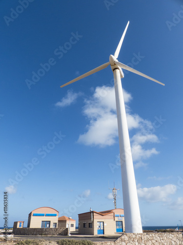 Wind turbine for osmosis ocean water treatment.