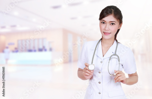 nurse with stethoscope in hospital