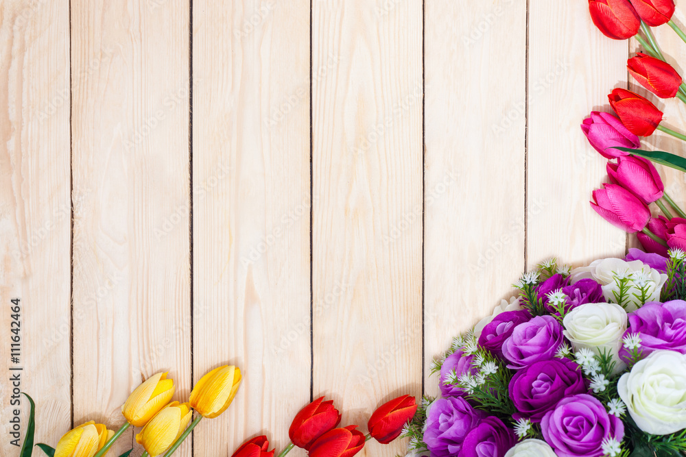Bouquet white and purple roses. Pink, red, yelow, tulips on wood Bouquet white and purple roses. Pink, red, yelow, tulips on wood