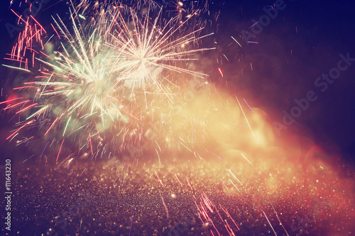 abstract holiday background, glitter lights and firework