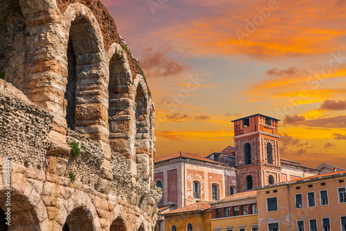 The ruins of the ancient Roman arena in Verona at sunset. Italy.