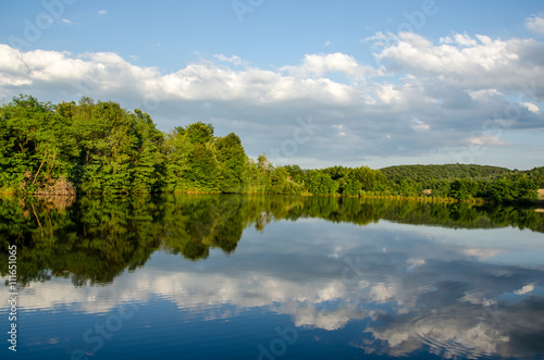 Mountain Lake with blue mountains in the background