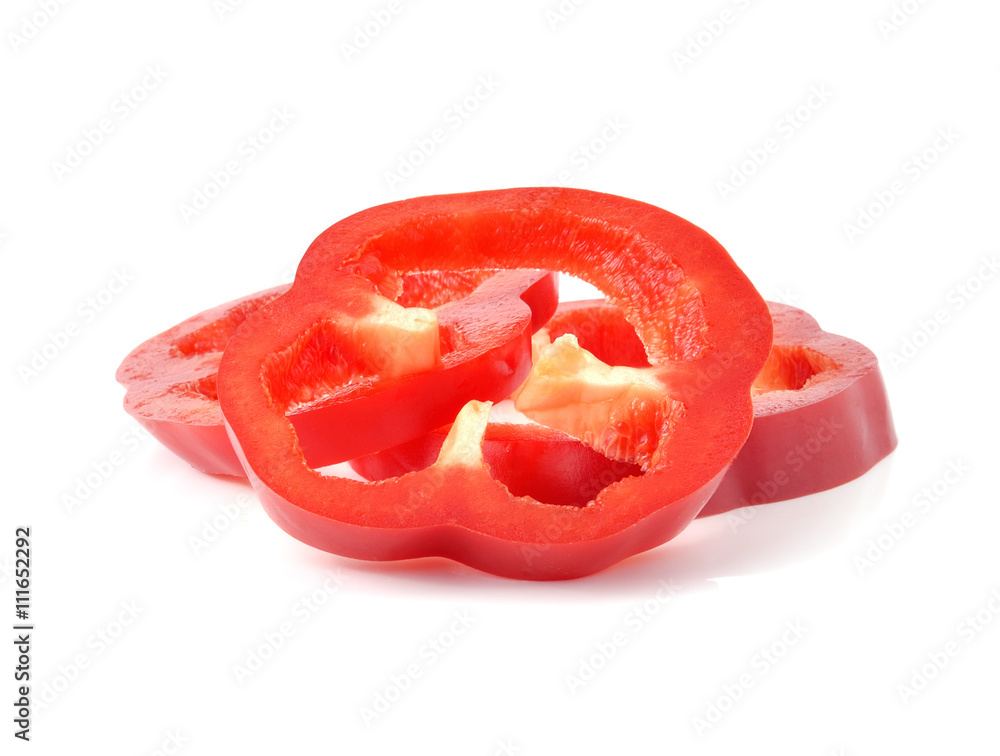 Fresh red pepper slices isolated on white Fresh red pepper slices isolated on white