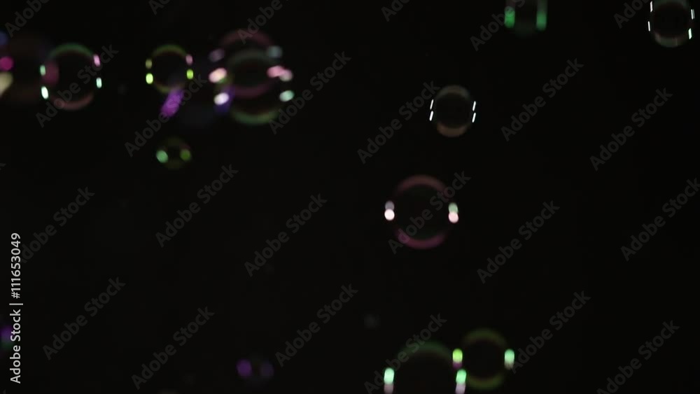 Soap bubbles on a black studio background Soap bubbles on a black studio background