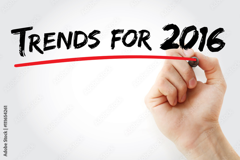Hand writing Trends for 2016 with red marker, business concept Hand writing Trends for 2016 with red marker, business concept