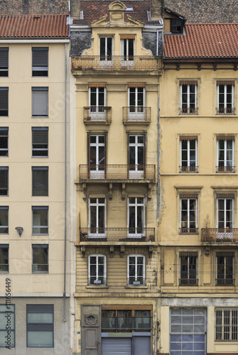 Facade of an old building in the old city center of Lyon, France.