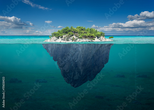 Beautiful solitude island with green trees in the ocean
