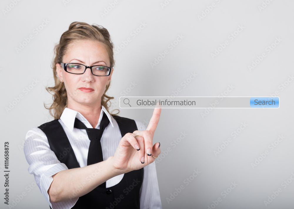Global information written in search bar on virtual screen. Internet technologies in business and home. woman in business suit and tie, presses a finger on a virtual screen Global information written in search bar on virtual screen. Internet technologies in business and home. woman in business suit and tie, presses a finger on a virtual screen