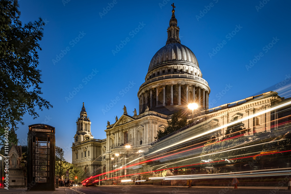 St Paul’s cathedral at night with traffic creating light trails