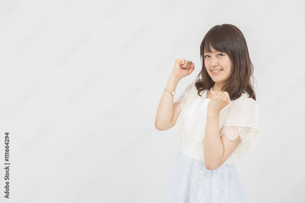 ガッツポーズする女性 ガッツポーズする女性