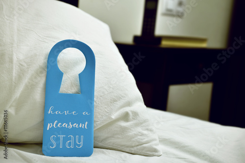 Canvas-taulu text have a pleasant stay in a door hanger