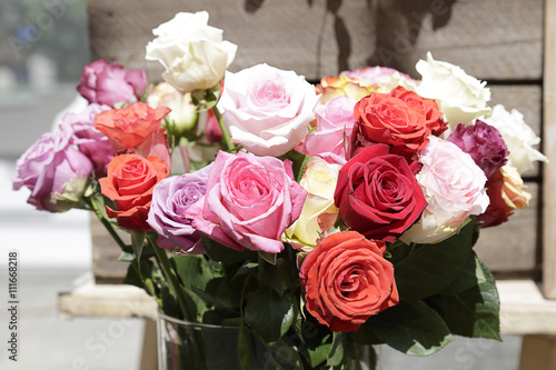 Bouquet of roses of different colors in a flower market