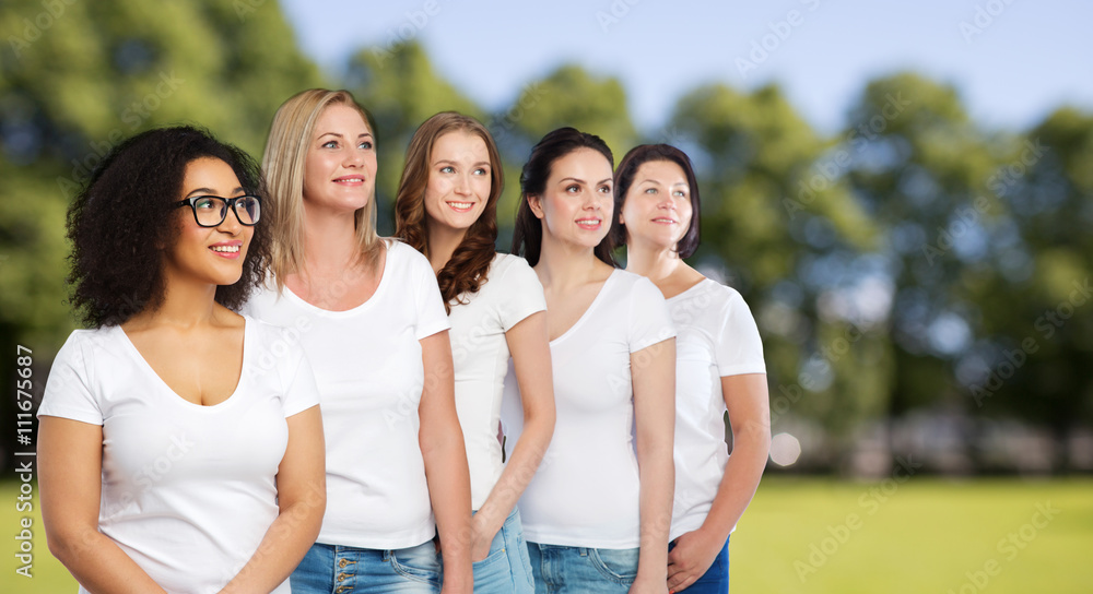 group of happy different women in white t-shirts