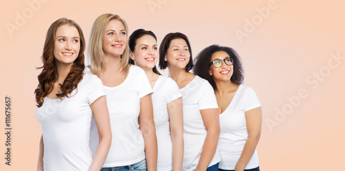 group of happy different women in white t-shirts