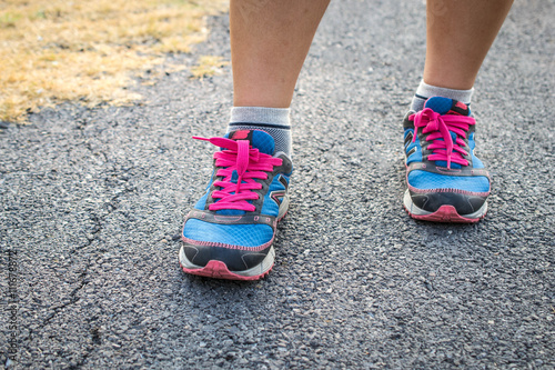 woman wearing sports shoes, walkings or running