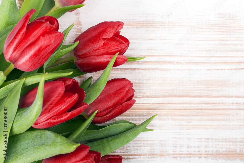 tulip bouquet on white wooden background tulip bouquet on white wooden background