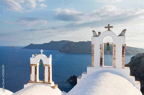 white belfries Santorini island, Greece