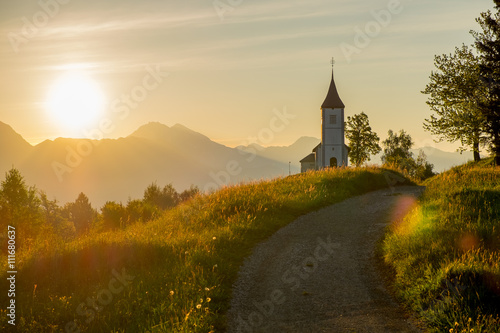 Catholic Church of Saints Primus and Felician, on the Hill at Sunrise in Jamnik, Slovenia