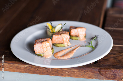 Fried salmon on plate