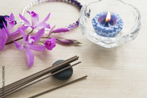 stick incense and orchid photo