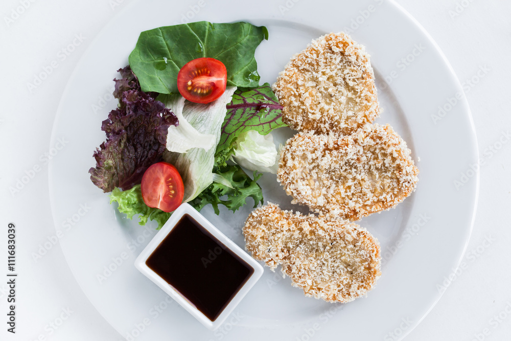 Breading pork with fresh vegetables Breading pork with fresh vegetables