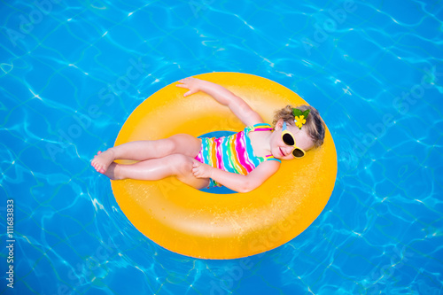 Little girl in swimming pool