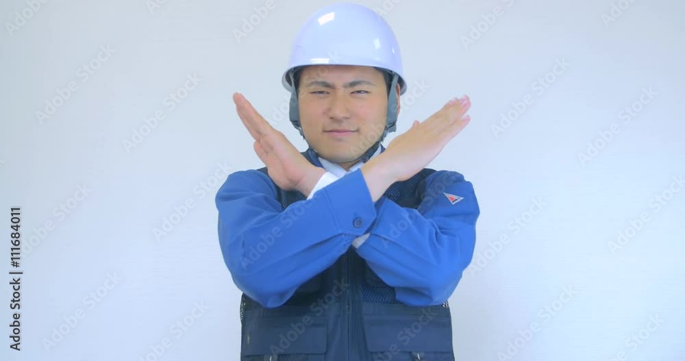 Japanese construction Man giving negative sign Japanese construction Man giving negative sign