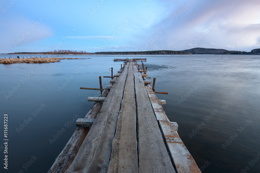 old wooden pier on the lake