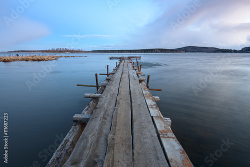 old wooden pier on the lake