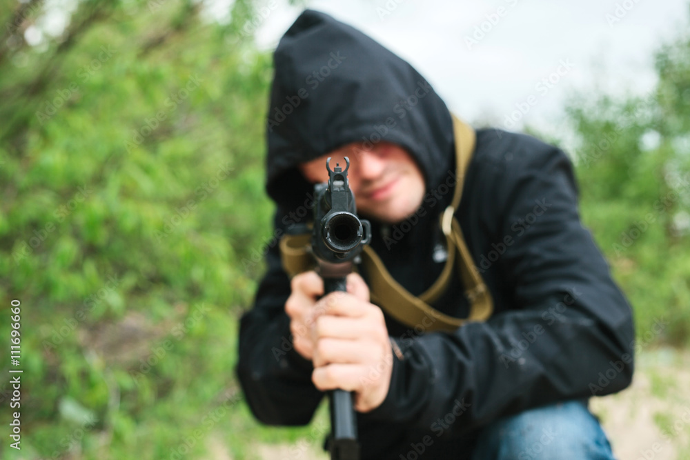 Obraz premium criminal with a weapon