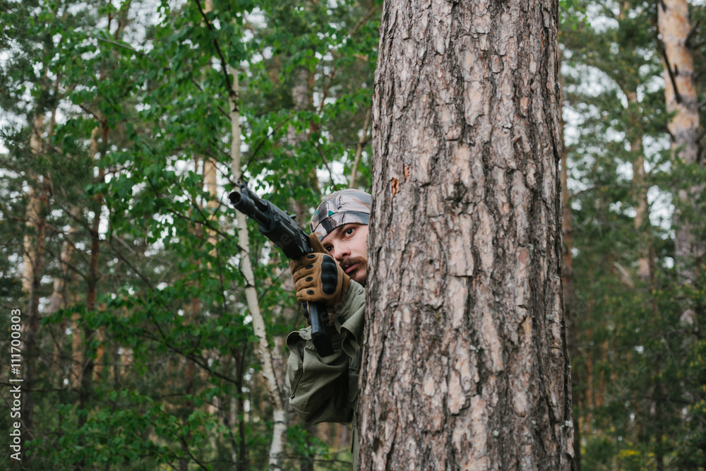 Armed man in a zone of armed conflict Armed man in a zone of armed conflict