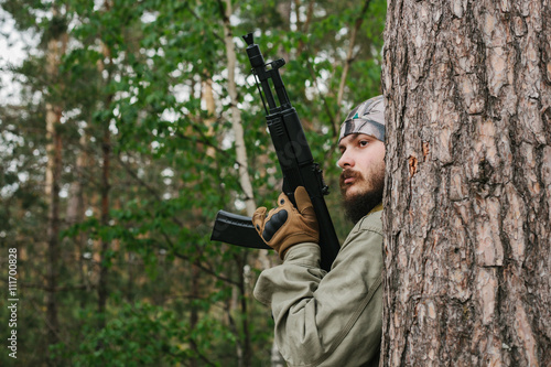 Armed man in a zone of armed conflict