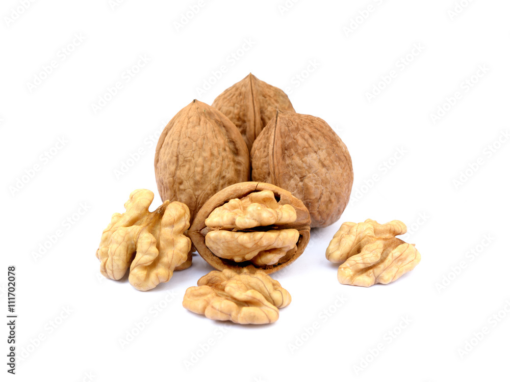 Fresh walnuts with a shell isolated on white background Fresh walnuts with a shell isolated on white background