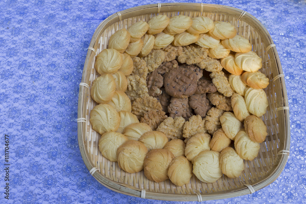 Fototapeta premium Assorted Cookies in bamboo basket 