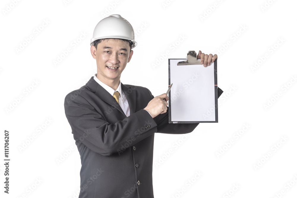 Smiling handsome foreman in helmet showing blank paper on clipboard over white background, engineering, repair, construction, building people and maintenance concept Smiling handsome foreman in helmet showing blank paper on clipboard over white background, engineering, repair, construction, building people and maintenance concept
