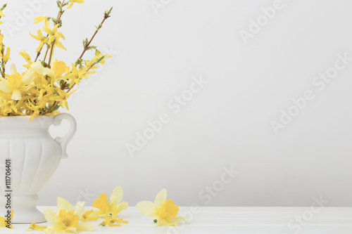 still life with yellow flowers