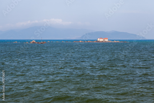 Small island in the sea, Nha Trang, Vietnam © alexkazachok