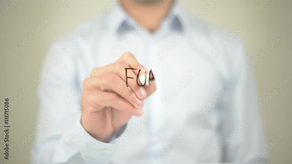 Fun , Man writing on transparent screen Fun , Man writing on transparent screen