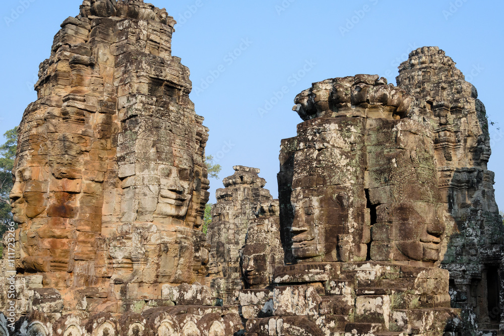 Stone face in Bayon Temple at Angkor Wat complex in Siem Reap Cambodia