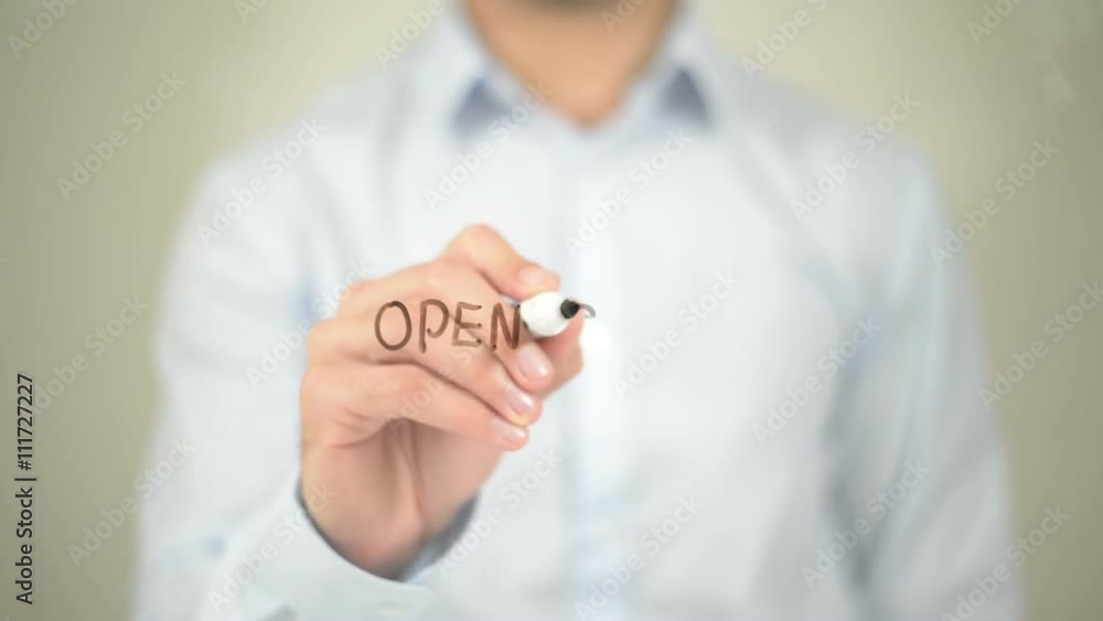 Open Source , Man writing on transparent screen Open Source , Man writing on transparent screen