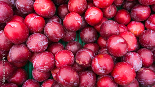 Ripe Plums Background.  Fresh ripe red plums