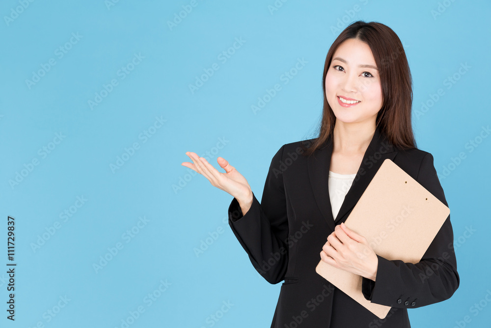 portrait of asian businesswoman showing isolated on blue background portrait of asian businesswoman showing isolated on blue background