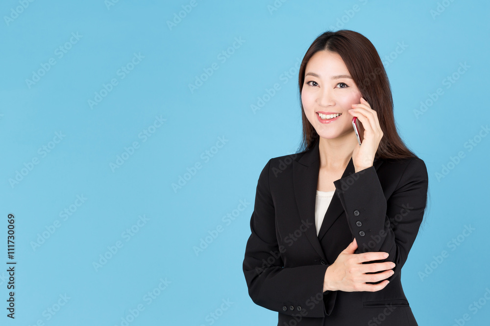 portrait of asian businesswoman talking isolated on blue background portrait of asian businesswoman talking isolated on blue background