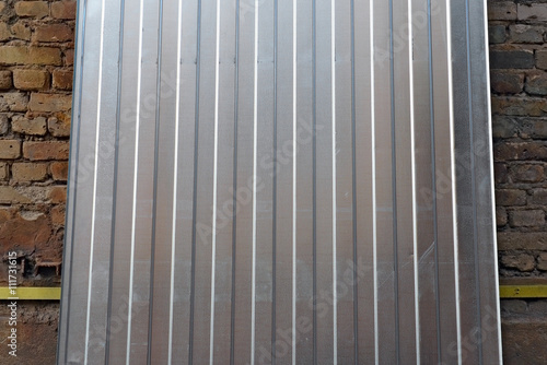 Franment of the corrugated metal sheet