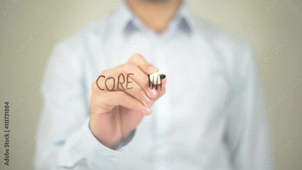 Core Values, Man writing on transparent screen Core Values, Man writing on transparent screen