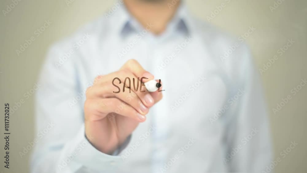 Save Energy, Man Writing on Transparent Screen Save Energy, Man Writing on Transparent Screen