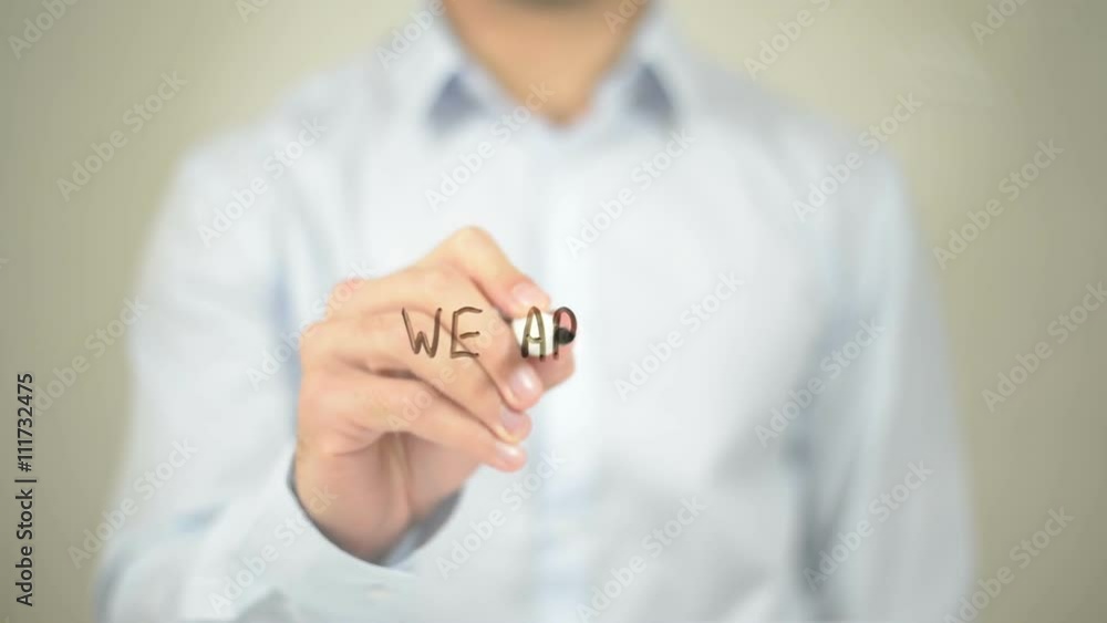 We are One, Man Writing on Transparent Screen We are One, Man Writing on Transparent Screen